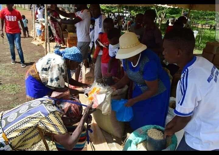 Community members packing grain and food supplies for a JOFA relief distribution